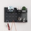 Shelf with three storage baskets and three hooks - Black